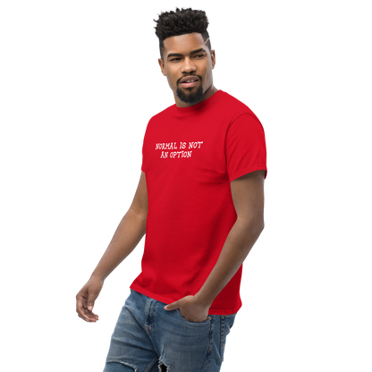 "Normal is not an option" printed on a red unisex classic tee worn by a male