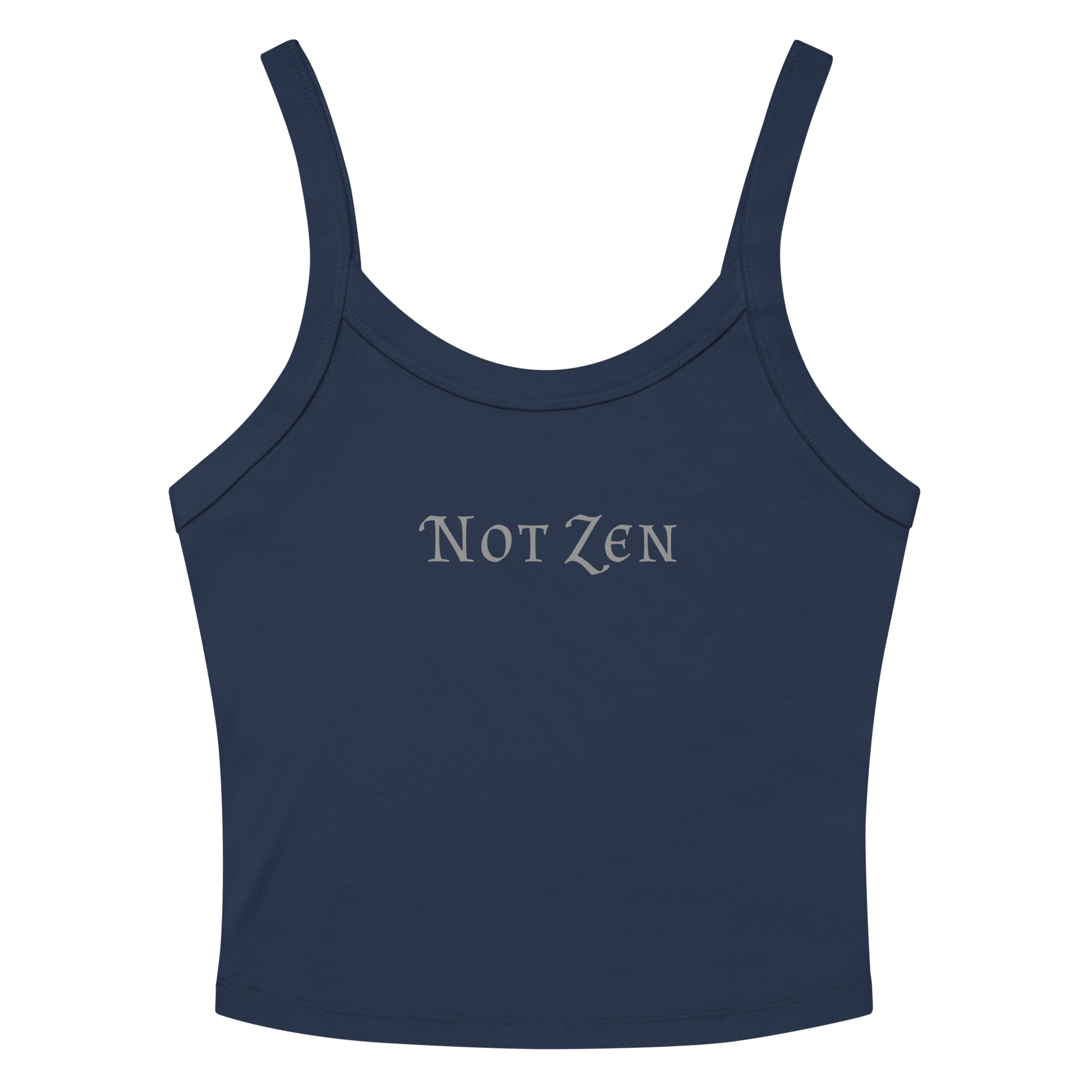 "Not zen" printed on a solid navy blend women's micro-rib tanktop laying on a flat surface amongst sunglasses and shorts