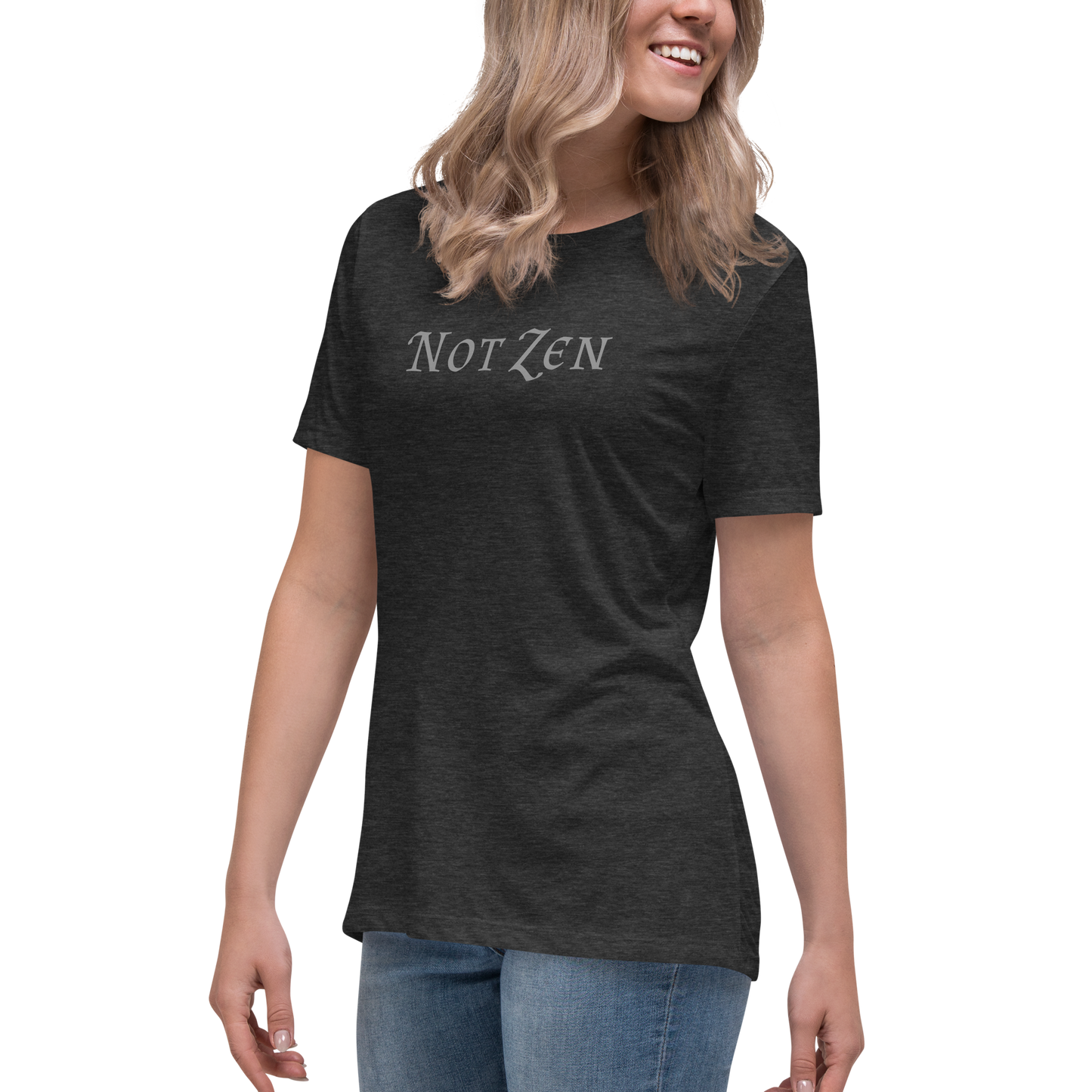 "Not zen" printed on a dark grey heather women's relaxed t-shirt worn by a female
