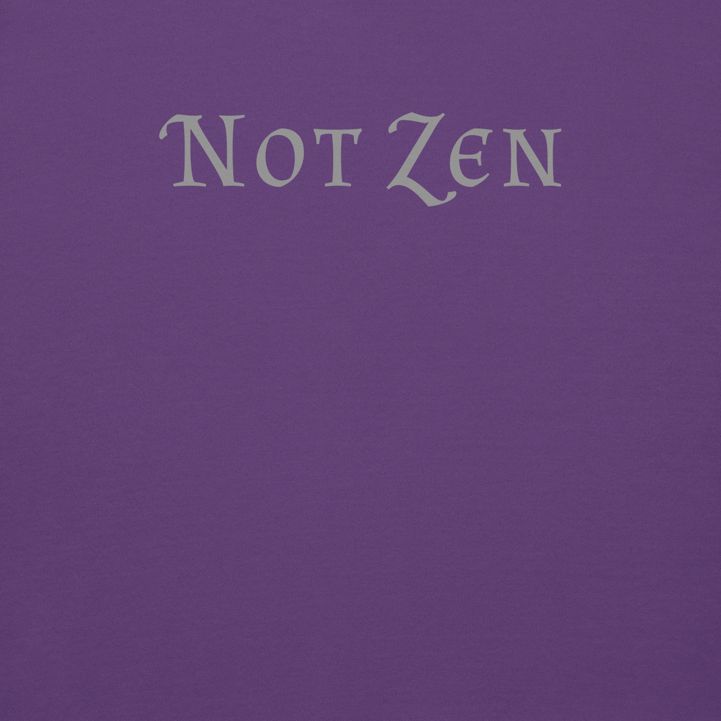 "Not zen" printed on a purple background