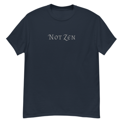"Not zen" printed on a navy unisex classic tee laying on a flat surface