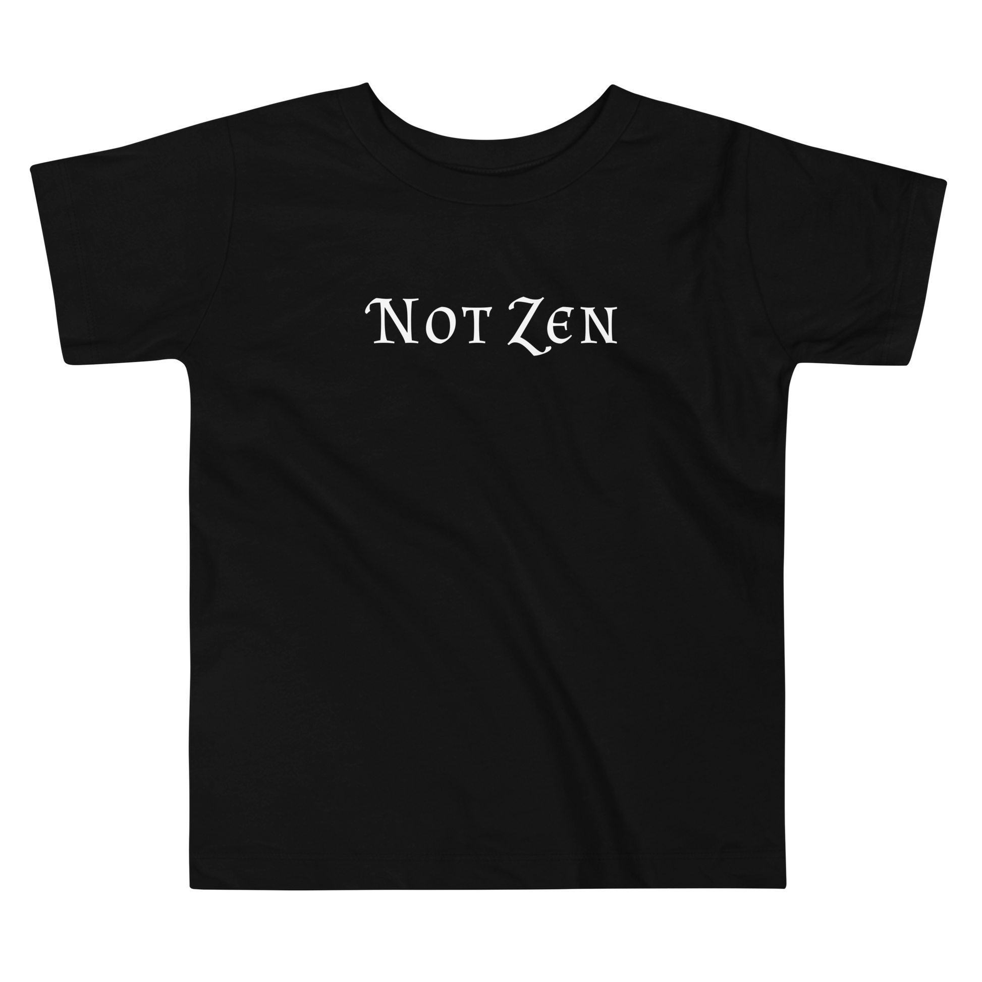 "Not zen" printed on a black toddler short sleeve tee laying on a flat surface