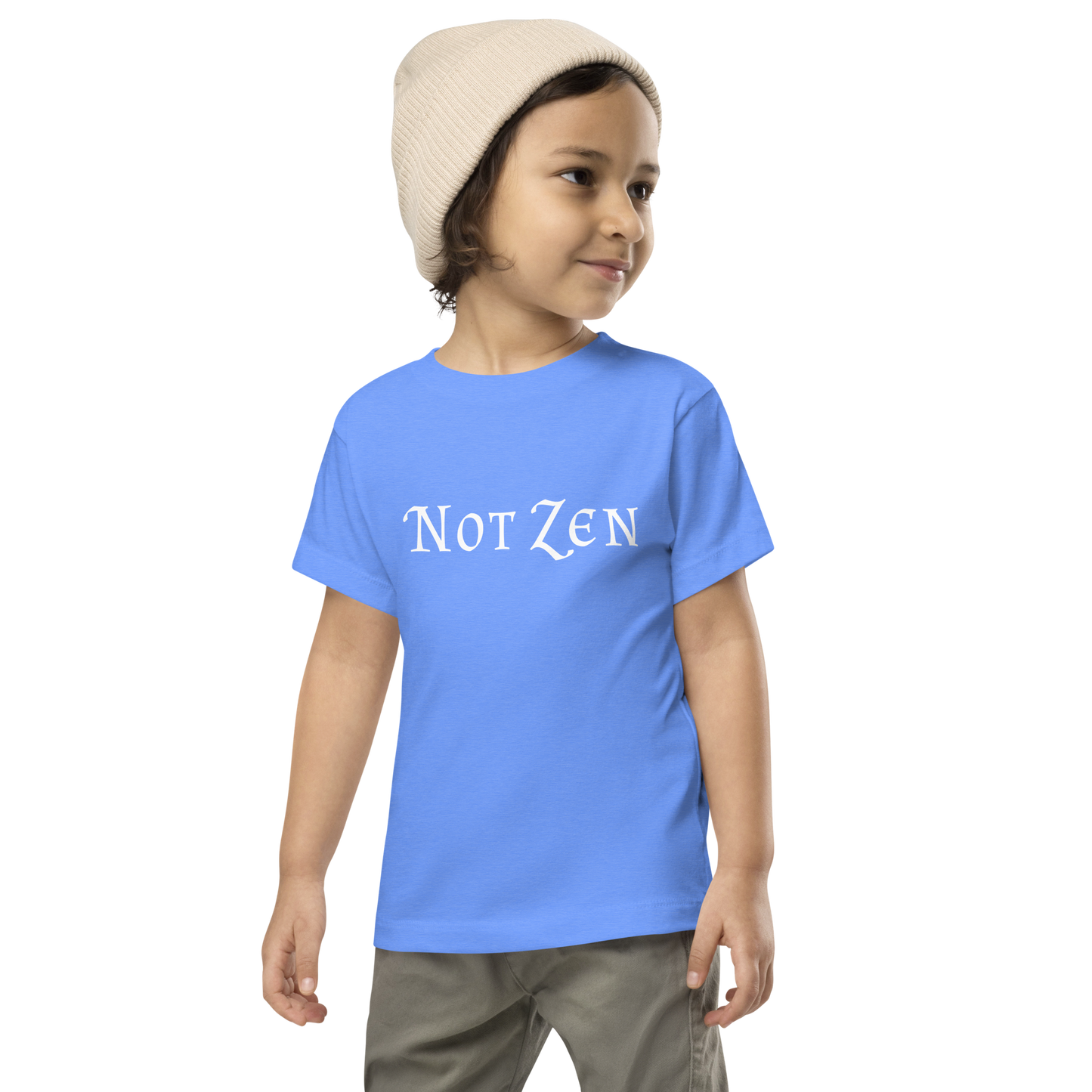 "Not zen" printed on a heather columbia blue toddler short sleeve tee worn by a male wearing a cap