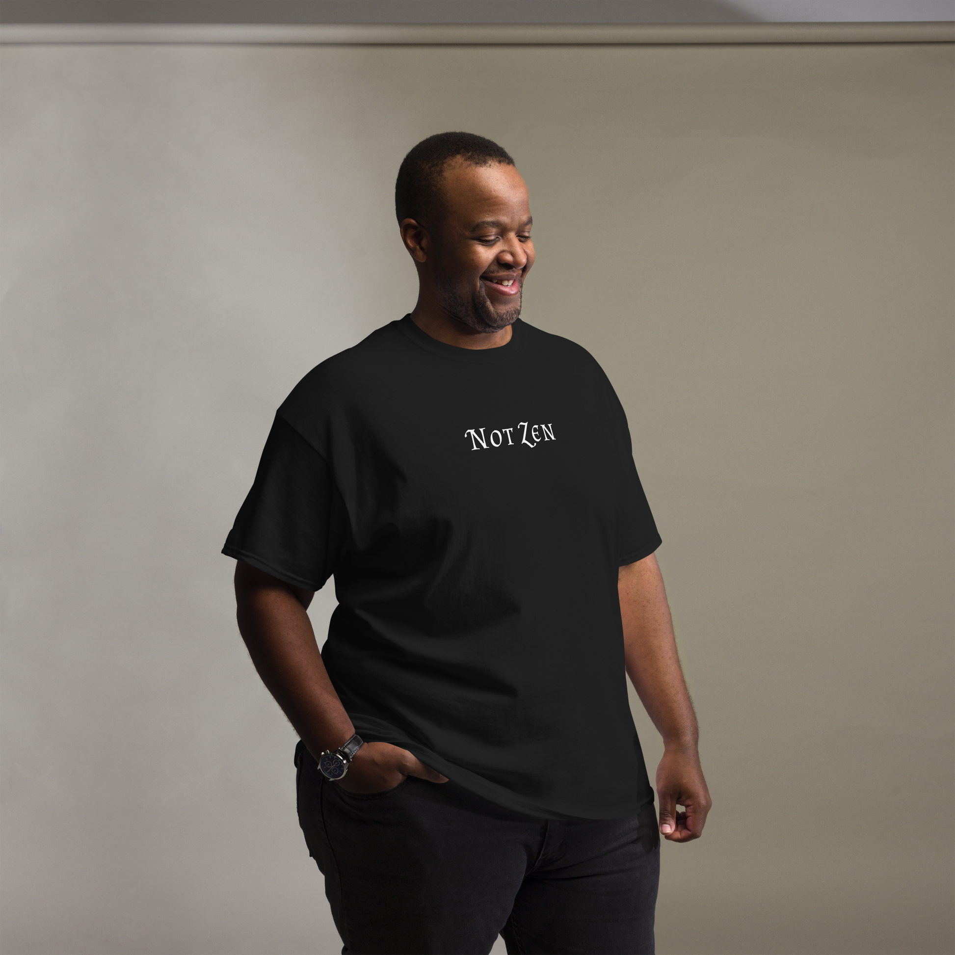 "Not zen" printed on a black unisex classic tee worn by a male