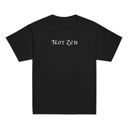 "Not zen" printed on a black youth classic tee laying on a flat surface