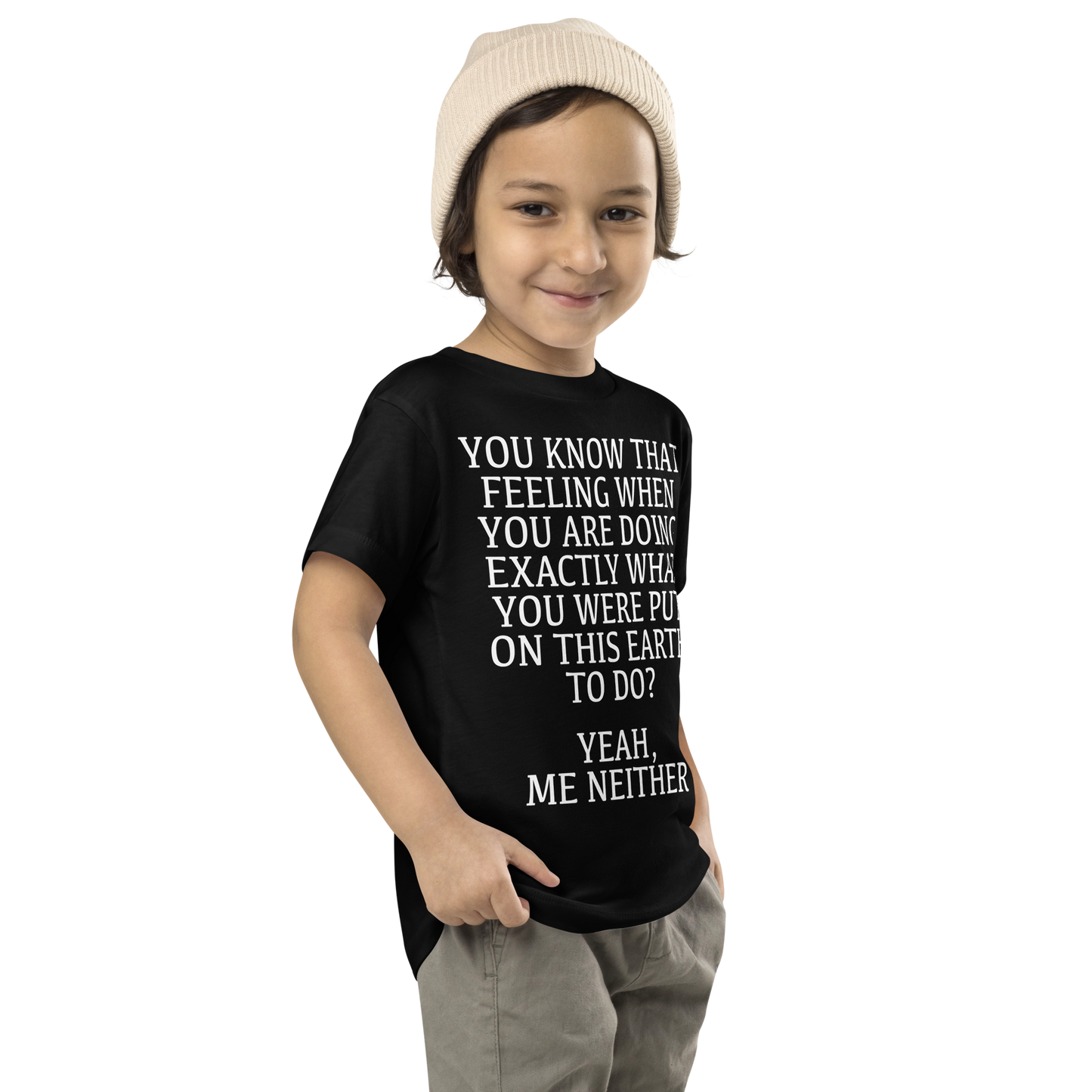 "You know that feeling when you are doing exactly what you were put on this earth to do? Yeah, Me Neither" printed on a black toddler short sleeve tee worn by a male who is also wearing a knit cap