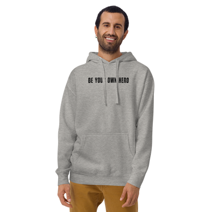 "Be your own here" printed on a carbon grey warn by a male