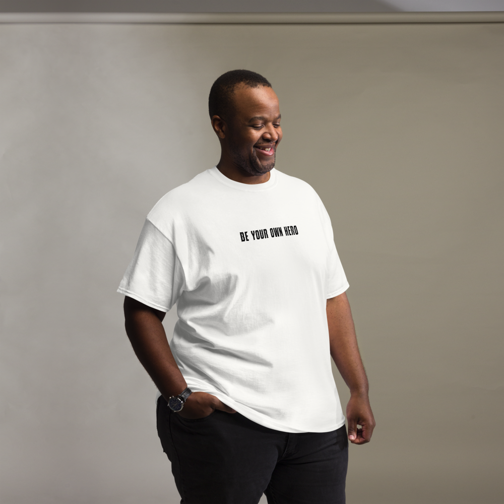 "Be your own here" printed on a white unisex classic tee worn by a male