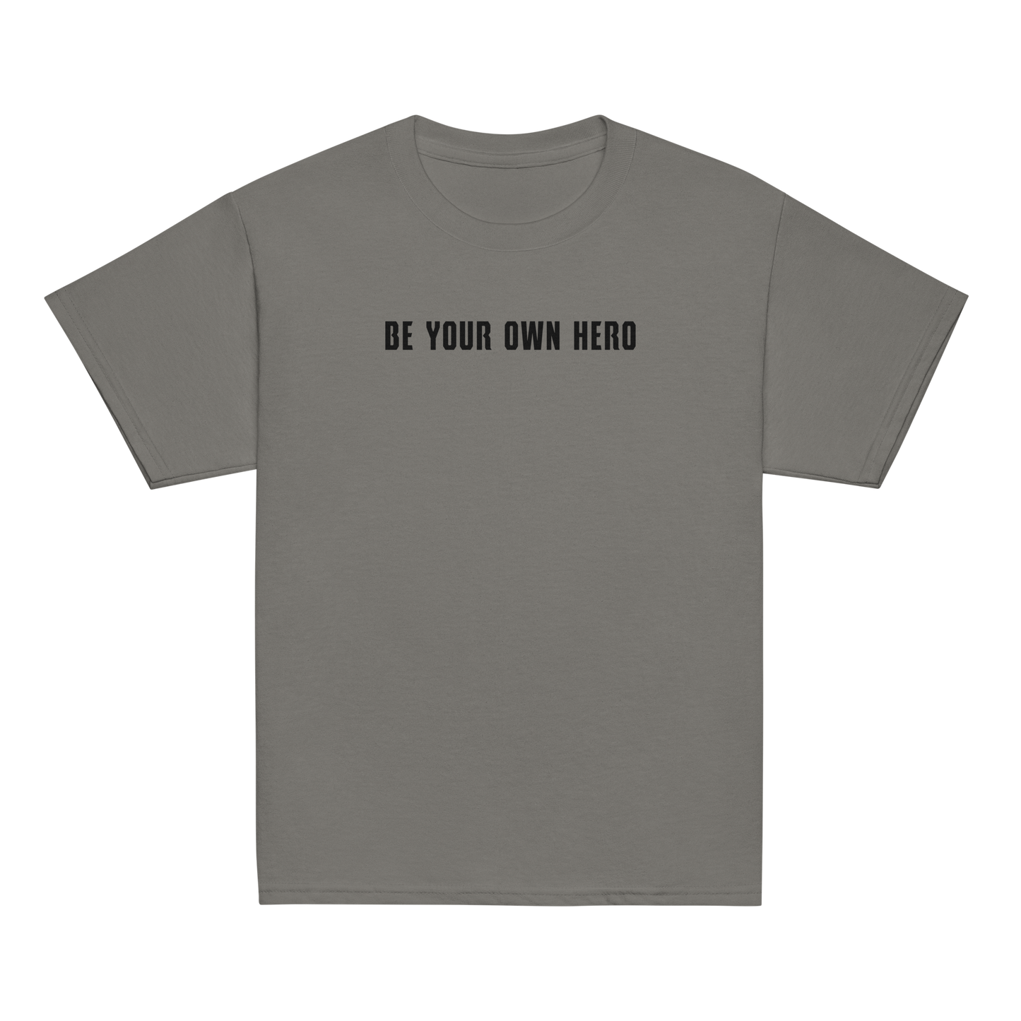 "Be your own here" printed on a charcoal youth classic tee laying on a flat surface