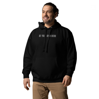 "Be your own here" printed on a black unisex hoodie worn by a male