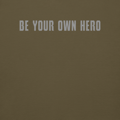 "Be your own here" printed on a military green background