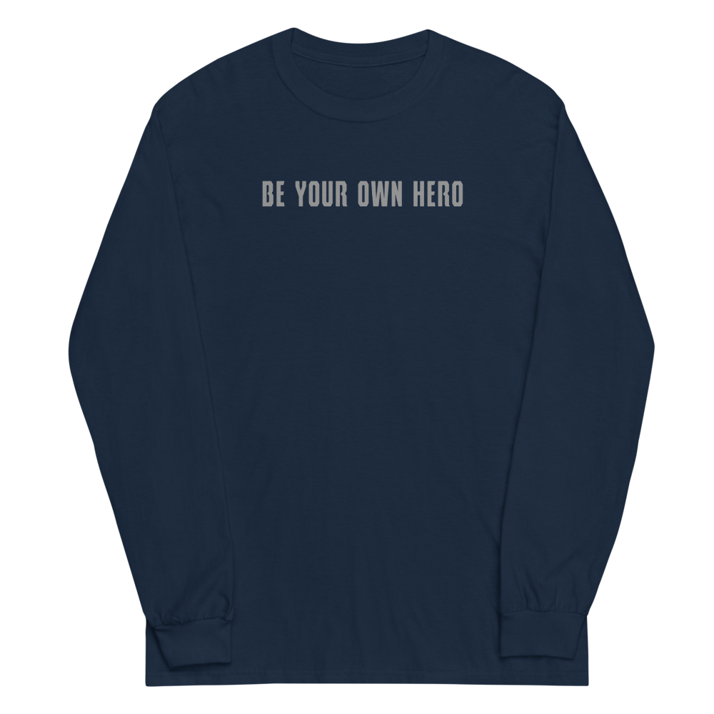 "Be your own here" printed on a navy men's long sleeve shirt laying on a flat surface