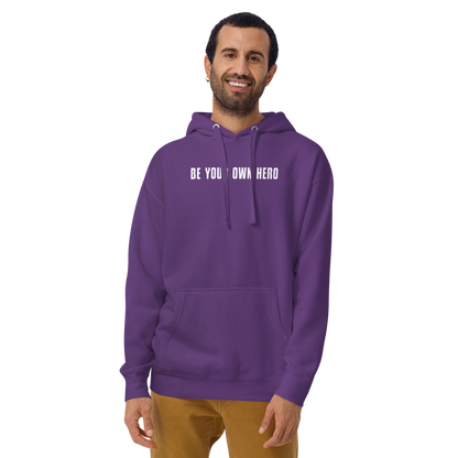 "Be your own here" printed on a purple warn by a male
