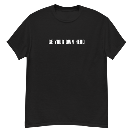 "Be your own here" printed on a black unisex classic tee laying on a flat surface
