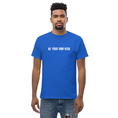 "Be your own here" printed on a royal unisex classic tee worn by a male