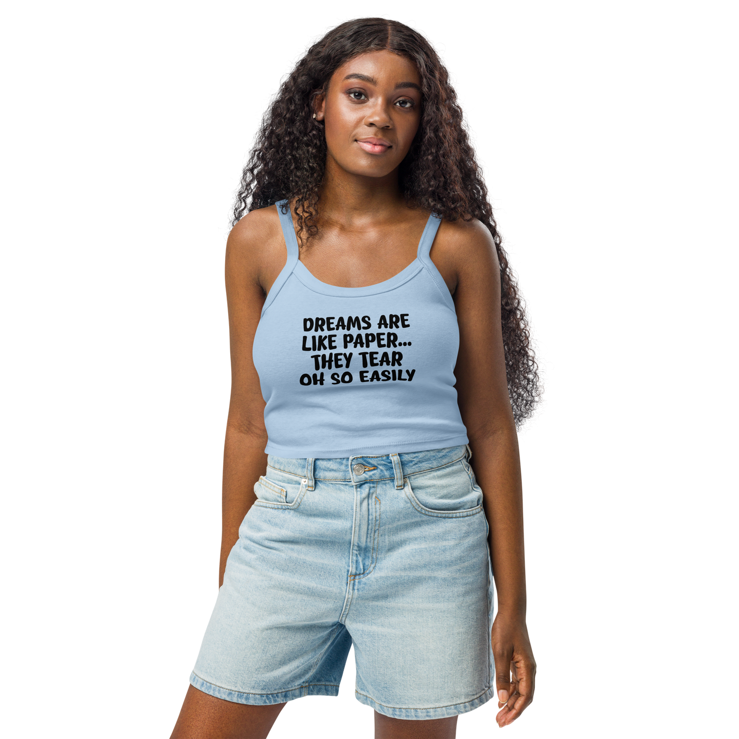 "Dreams are like paper, they tear oh so easily" printed on a solid baby blue blend women's micro-rib tanktop worn by a female