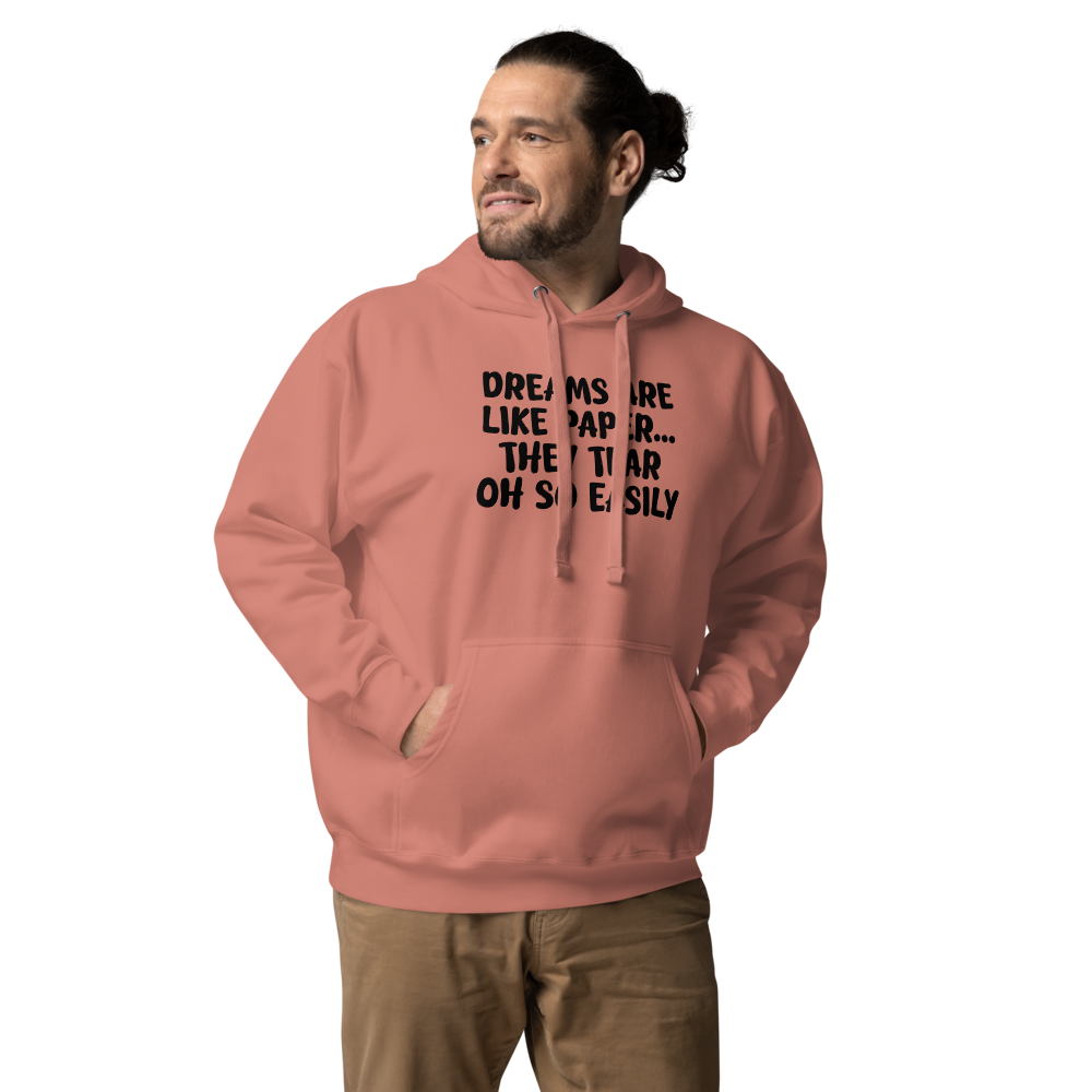 "Dreams are like paper, they tear oh so easily" printed on a dusty rose unisex hoodie worn by a male