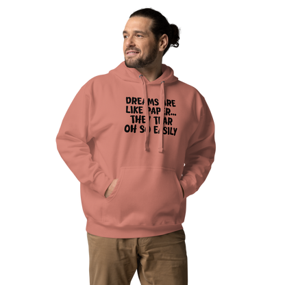 "Dreams are like paper, they tear oh so easily" printed on a dusty rose unisex hoodie worn by a male