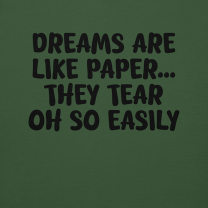 "Dreams are like paper, they tear oh so easily" printed on a forest green background