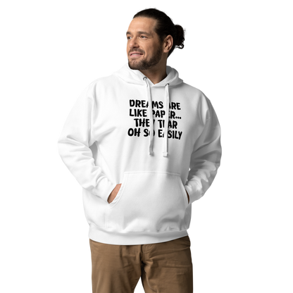"Dreams are like paper, they tear oh so easily" printed on a white unisex hoodie worn by a male