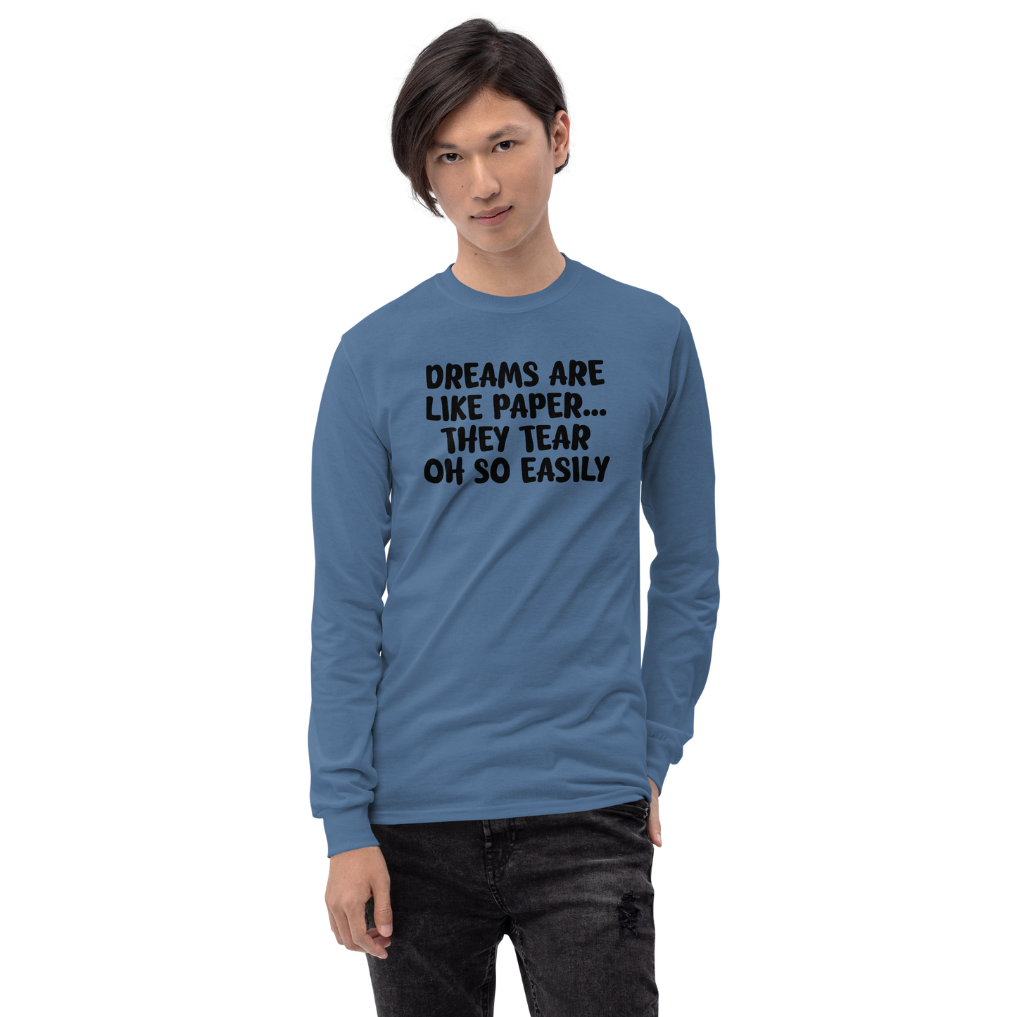"Dreams are like paper, they tear oh so easily" printed on a indigo blue men's long sleeve shirt worn by a male