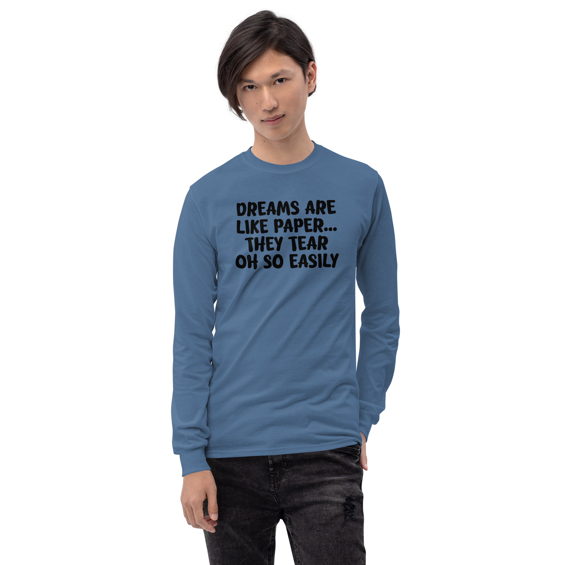 "Dreams are like paper, they tear oh so easily" printed on a indigo blue men's long sleeve shirt worn by a male