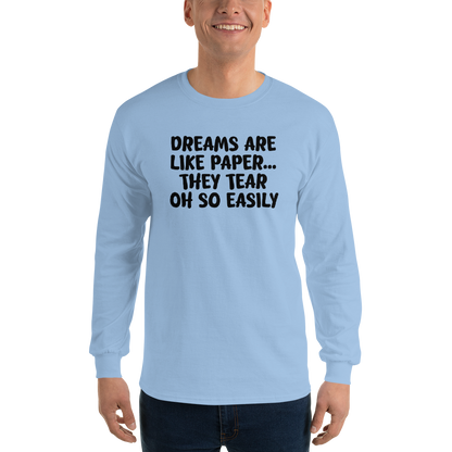 "Dreams are like paper, they tear oh so easily" printed on a light blue men's long sleeve shirt worn by a male