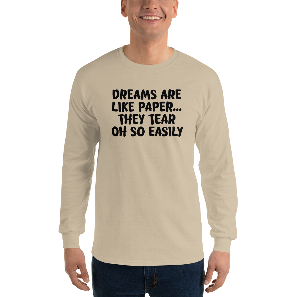 "Dreams are like paper, they tear oh so easily" printed on a sand men's long sleeve shirt worn by a male