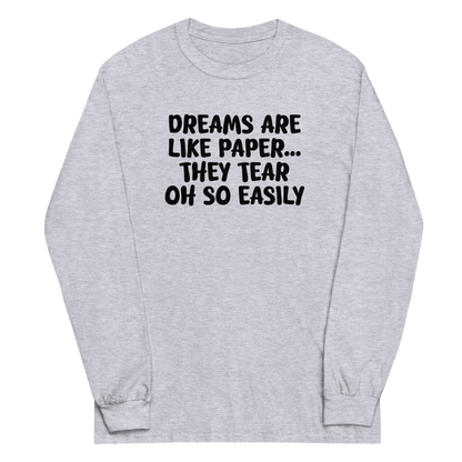 "Dreams are like paper, they tear oh so easily" printed on a sport grey men's long sleeve shirt laying on a flat surface
