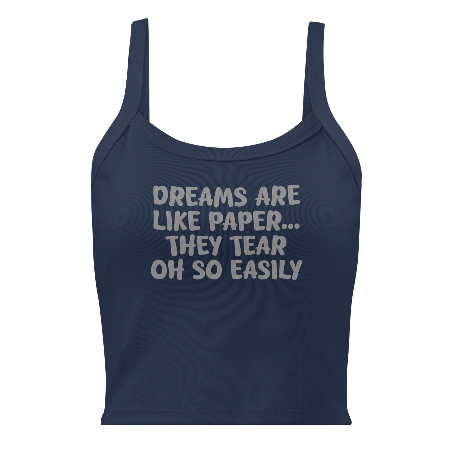 "Dreams are like paper, they tear oh so easily" printed on a solid navy blend women's micro-rib tanktop laying on a flat surface