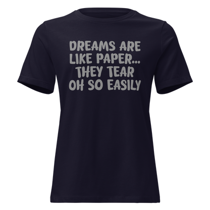 "Dreams are like paper, they tear oh so easily" printed on a navy on an invisible / simulated body