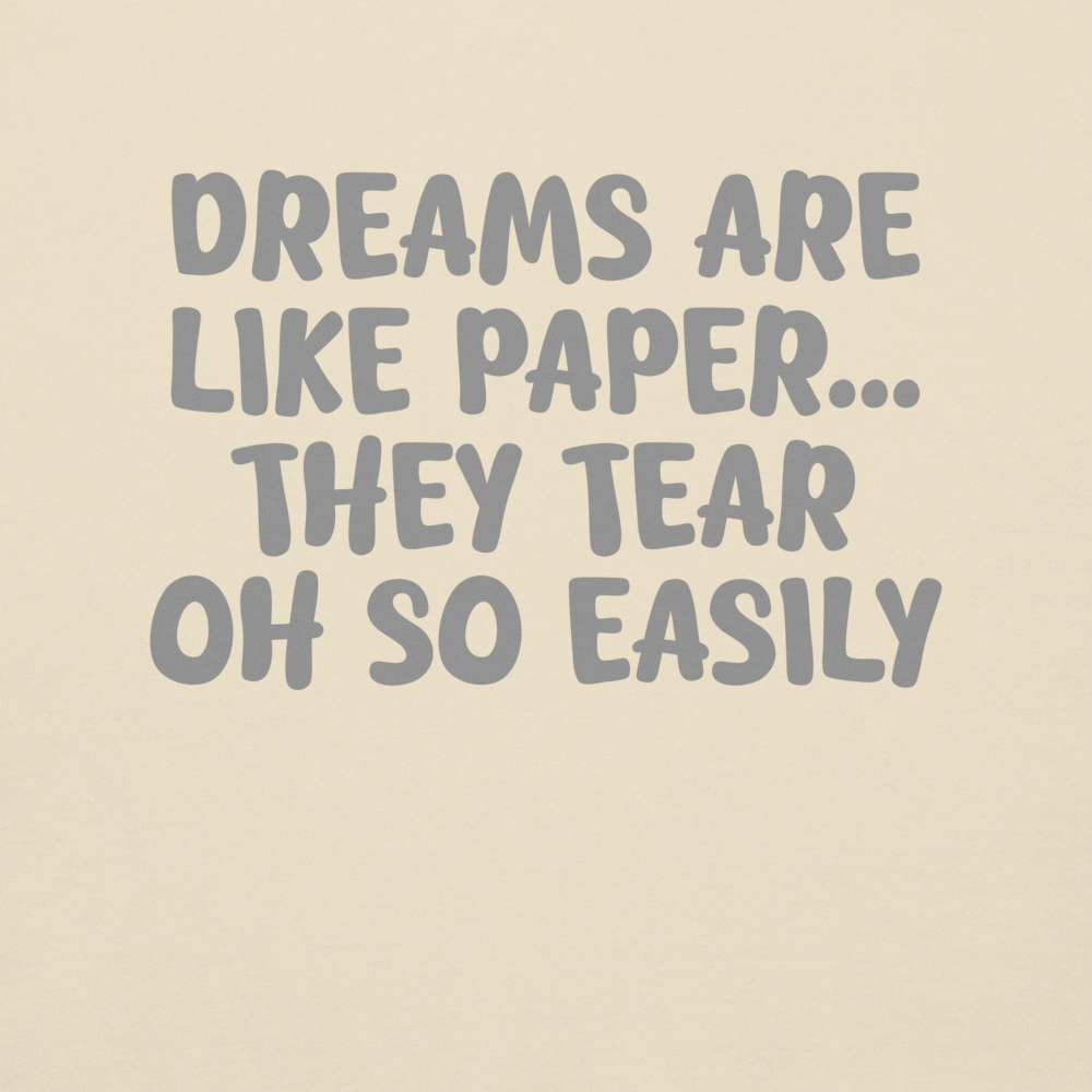 "Dreams are like paper, they tear oh so easily" printed on a bone background