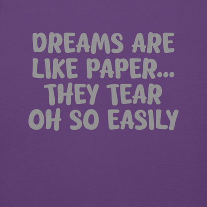 "Dreams are like paper, they tear oh so easily" printed on a purple background