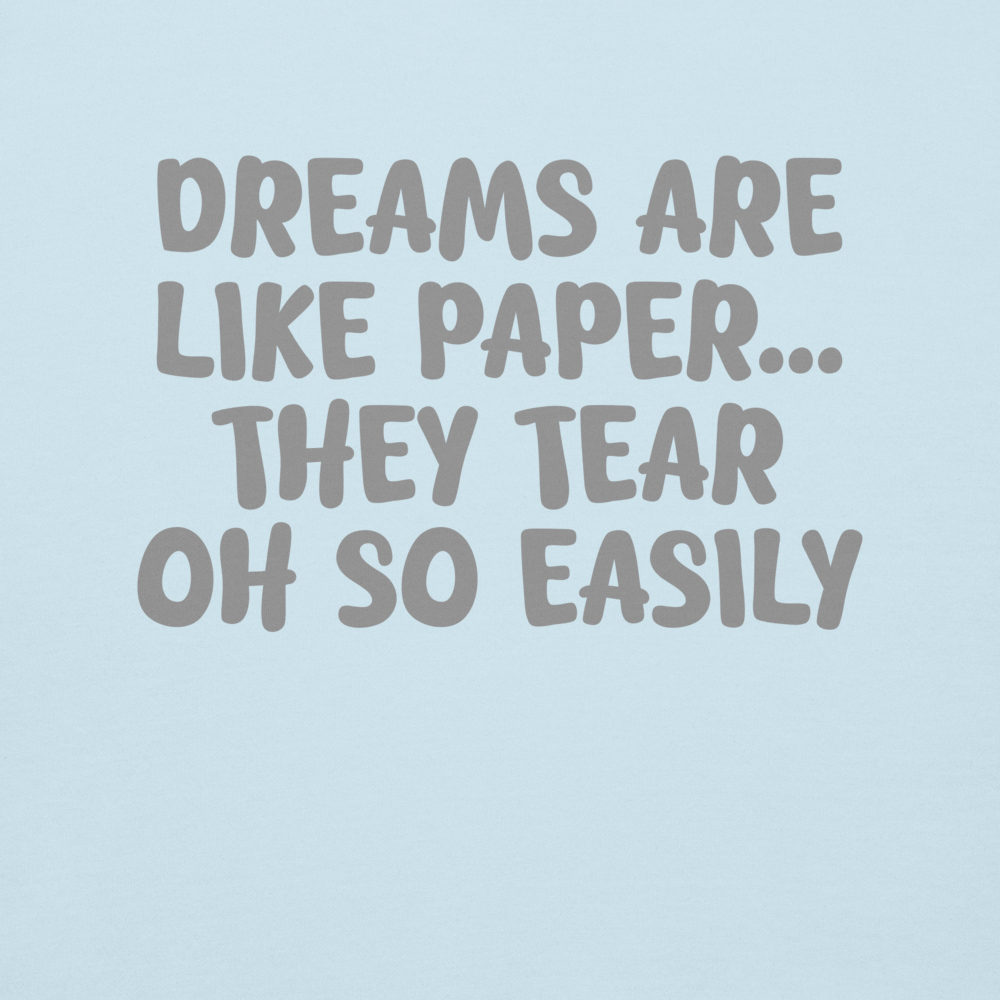 "Dreams are like paper, they tear oh so easily" printed on a sky blue background
