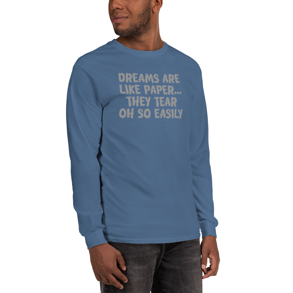 "Dreams are like paper, they tear oh so easily" printed on a indigo blue men's long sleeve shirt worn by a male