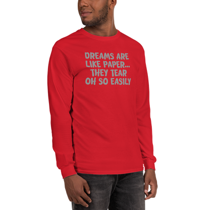 "Dreams are like paper, they tear oh so easily" printed on a red men's long sleeve shirt worn by a male