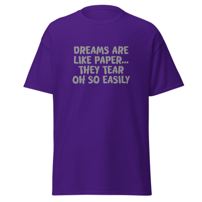 "Dreams are like paper, they tear oh so easily" printed on a purple on an invisible body