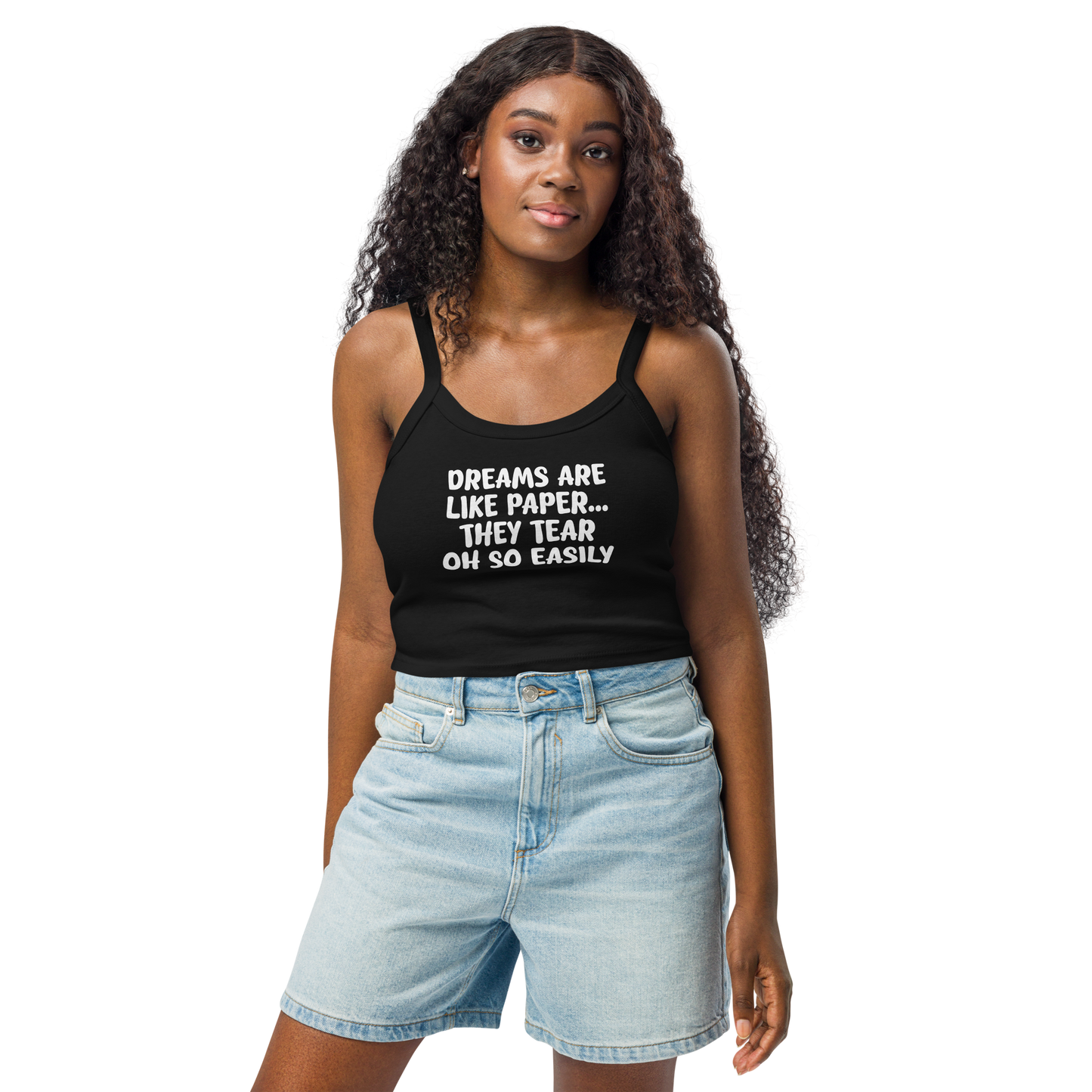 "Dreams are like paper, they tear oh so easily" printed on a solid black blend women's micro-rib tanktop worn by a female
