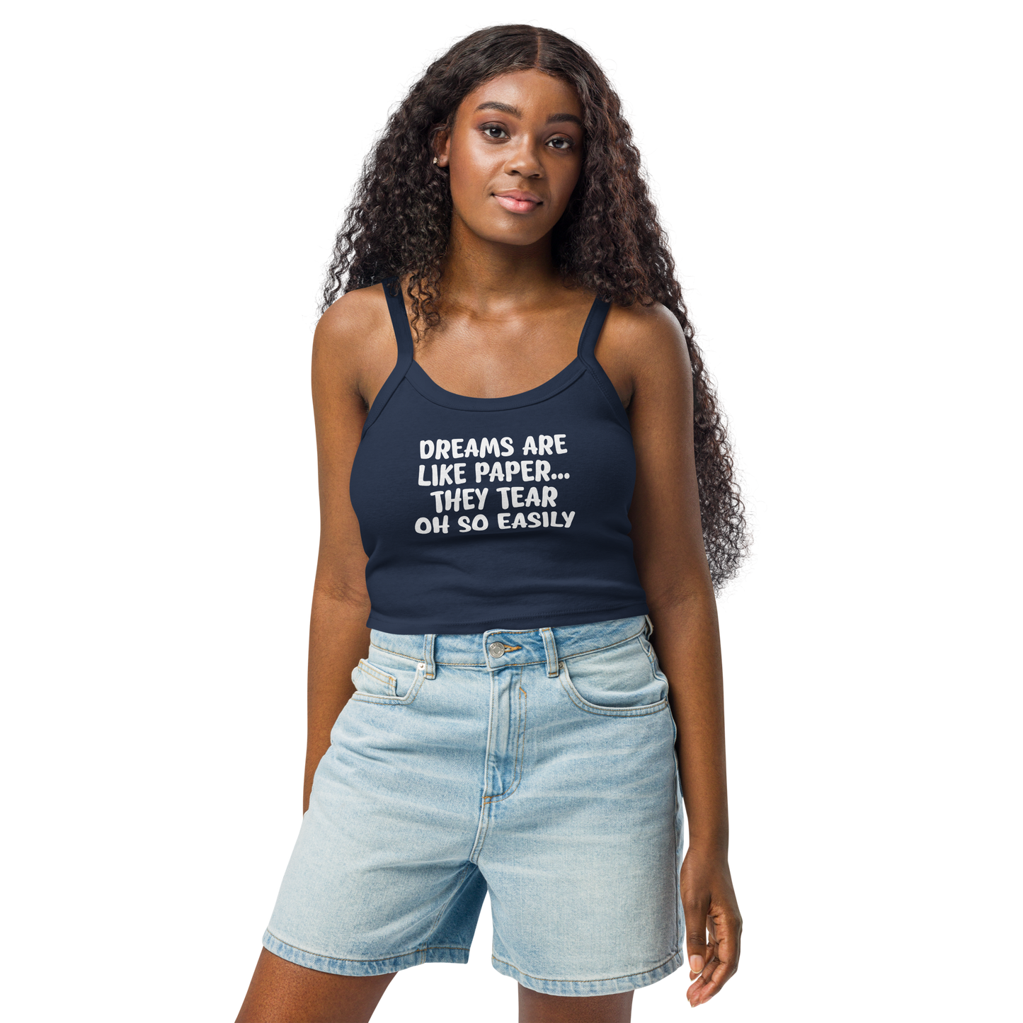 "Dreams are like paper, they tear oh so easily" printed on a solid navy blend women's micro-rib tanktop worn by a female
