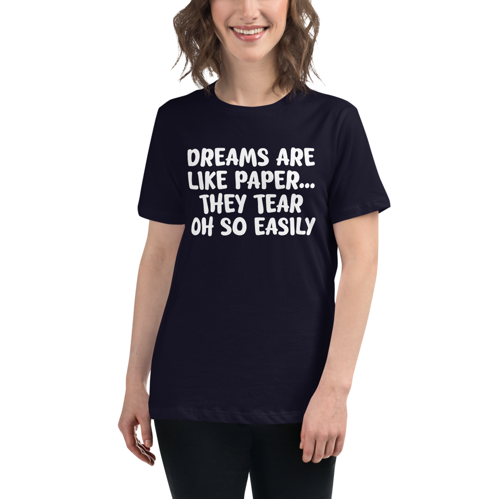 "Dreams are like paper, they tear oh so easily" printed on a navy women's relaxed t-shirt worn by a female
