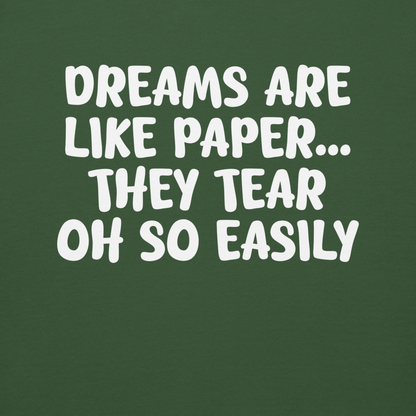 "Dreams are like paper, they tear oh so easily" printed on a forest green background