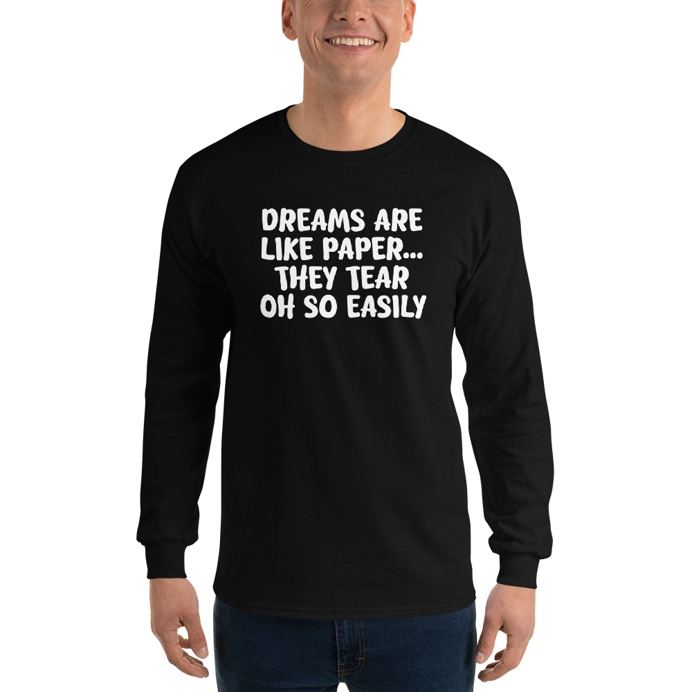 "Dreams are like paper, they tear oh so easily" printed on a black men's long sleeve shirt worn by a male