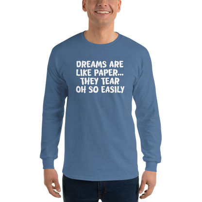 "Dreams are like paper, they tear oh so easily" printed on a indigo blue men's long sleeve shirt worn by a male