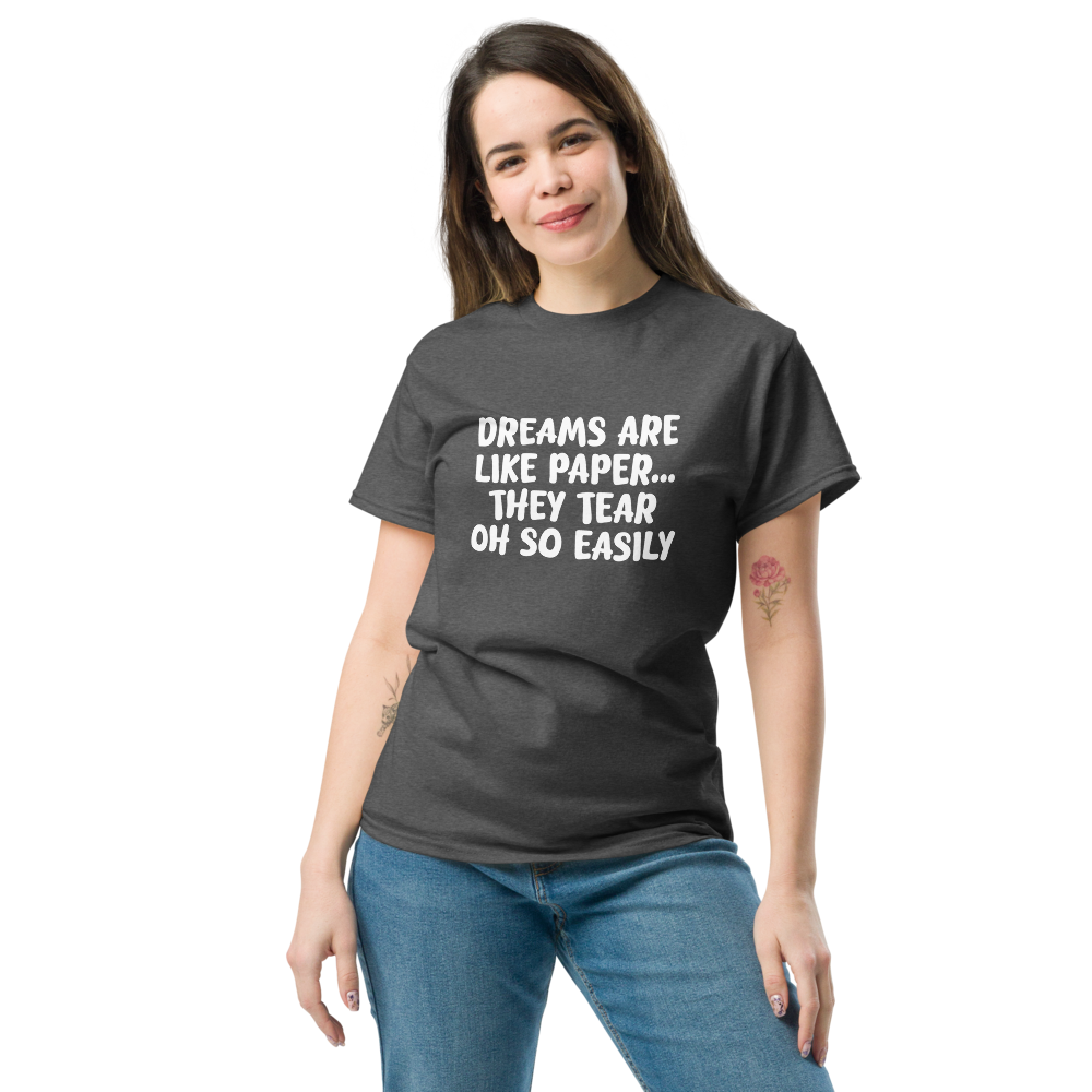 "Dreams are like paper, they tear oh so easily" printed on a dark heather unisex classic tee worn by a female