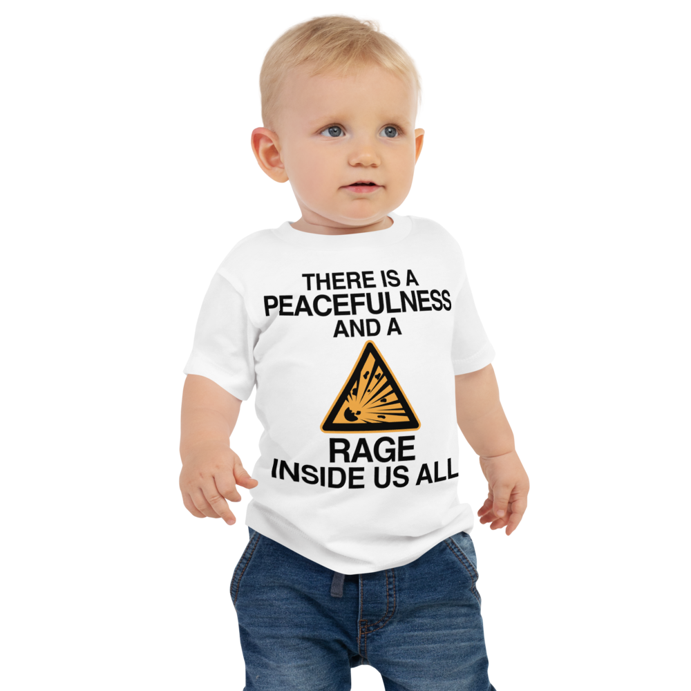 "There is a peacefulness and a rage inside us all" printed on a white baby jersey short sleeve tee worn by a male