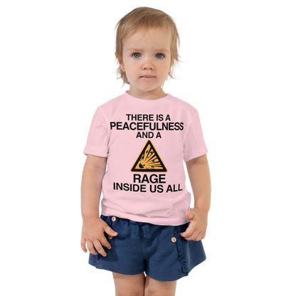 "There is a peacefulness and a rage inside us all" printed on a pink toddler short sleeve tee worn by a female
