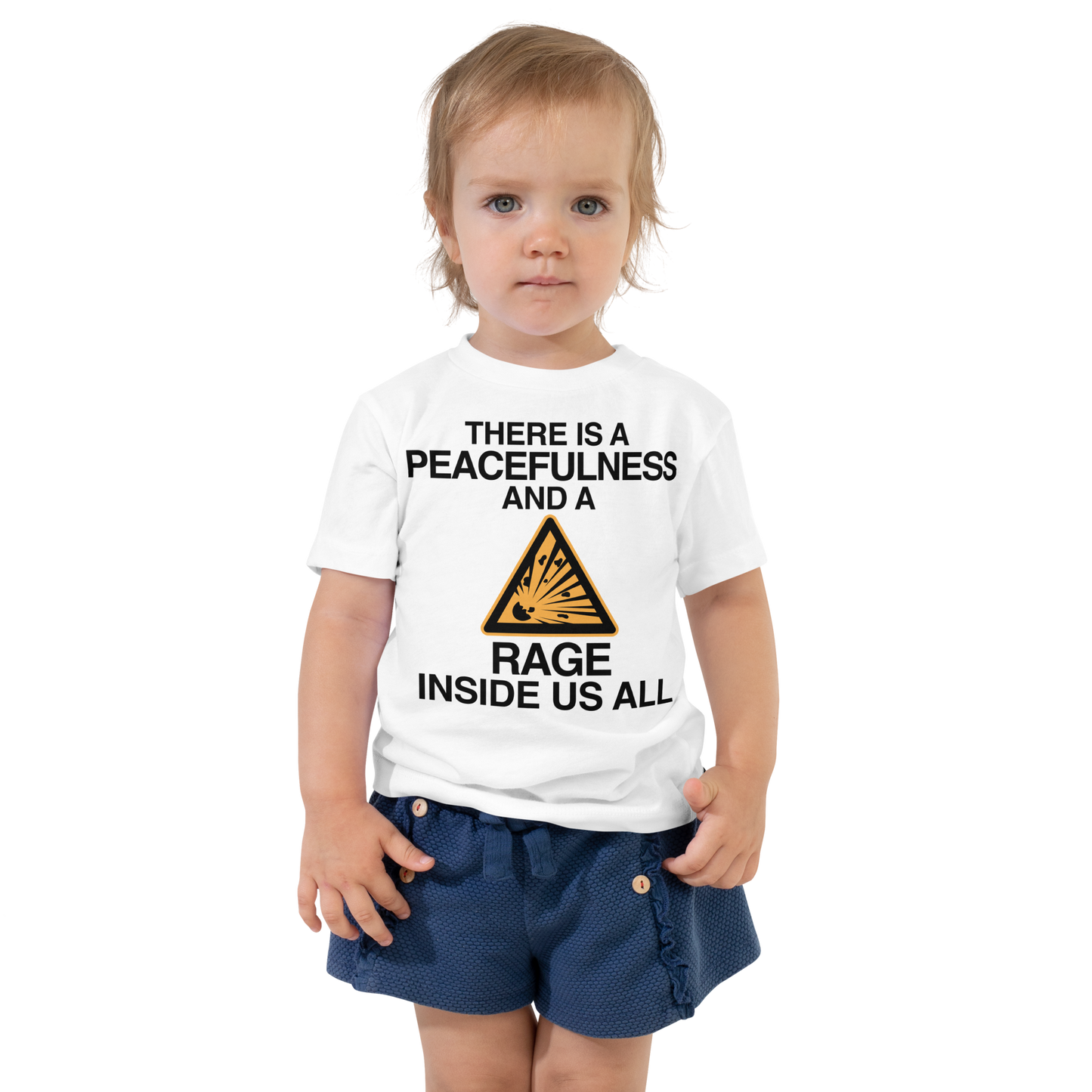 "There is a peacefulness and a rage inside us all" printed on a white toddler short sleeve tee worn by a female