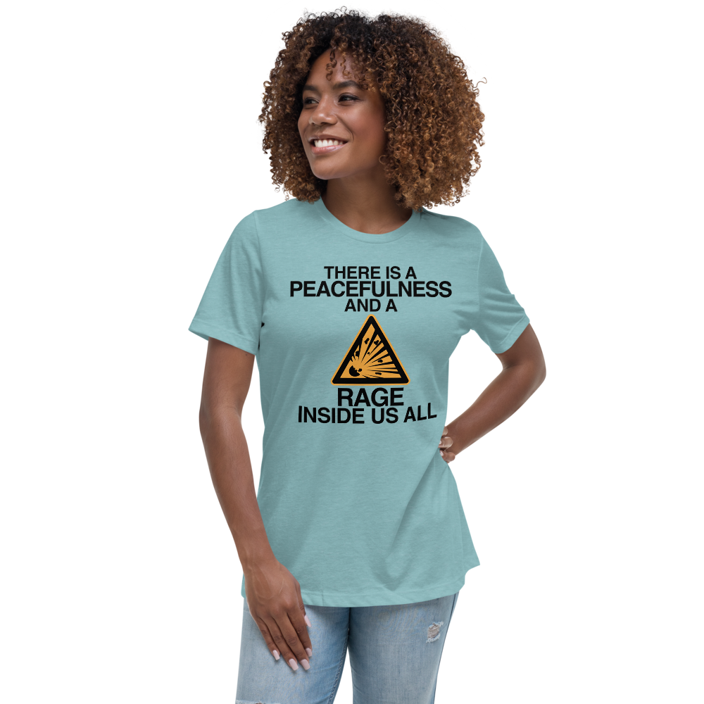"There is a peacefulness and a rage inside us all" printed on a heather blue lagoon women's relaxed t-shirt worn by a female