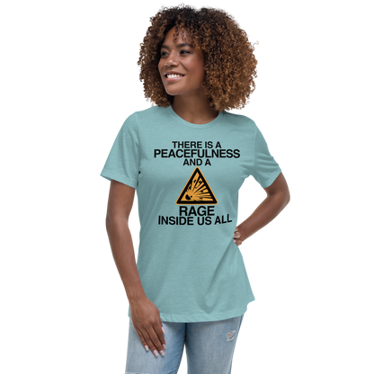 "There is a peacefulness and a rage inside us all" printed on a heather blue lagoon women's relaxed t-shirt worn by a female