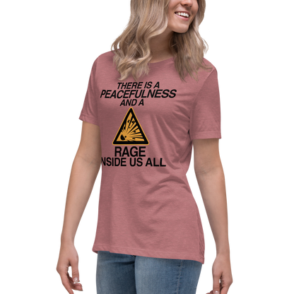 "There is a peacefulness and a rage inside us all" printed on a heather mauve women's relaxed t-shirt worn by a female
